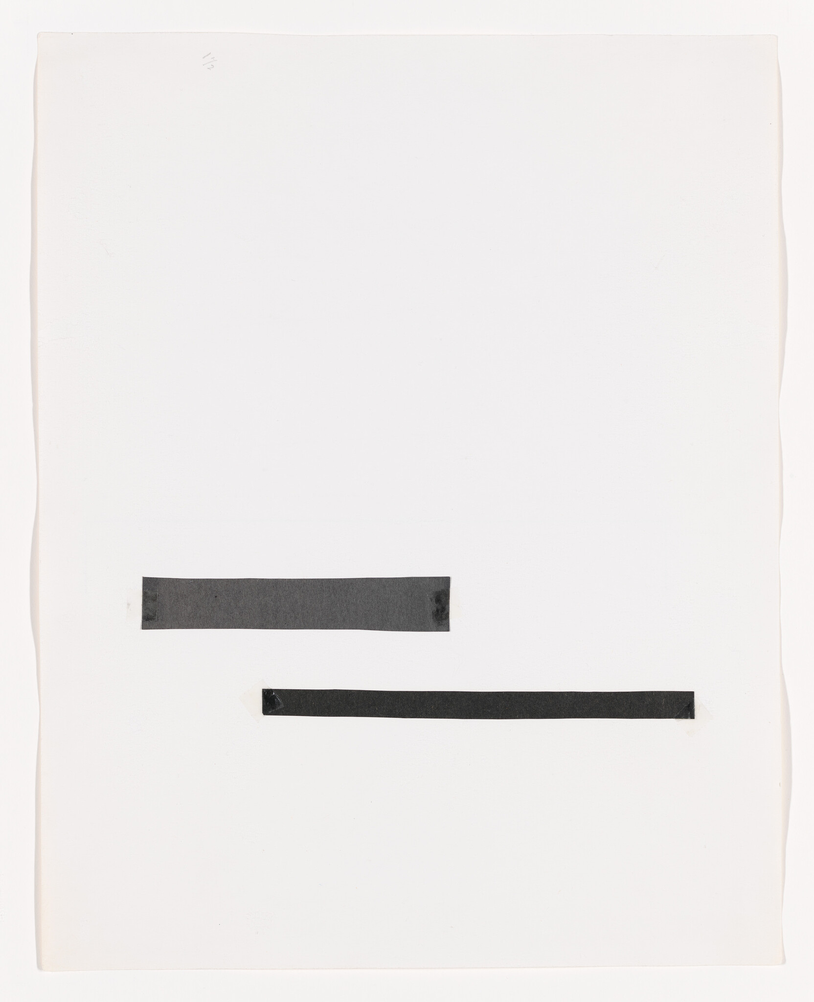 A white sheet with two horizontal black tape strips, one shorter above one longer.