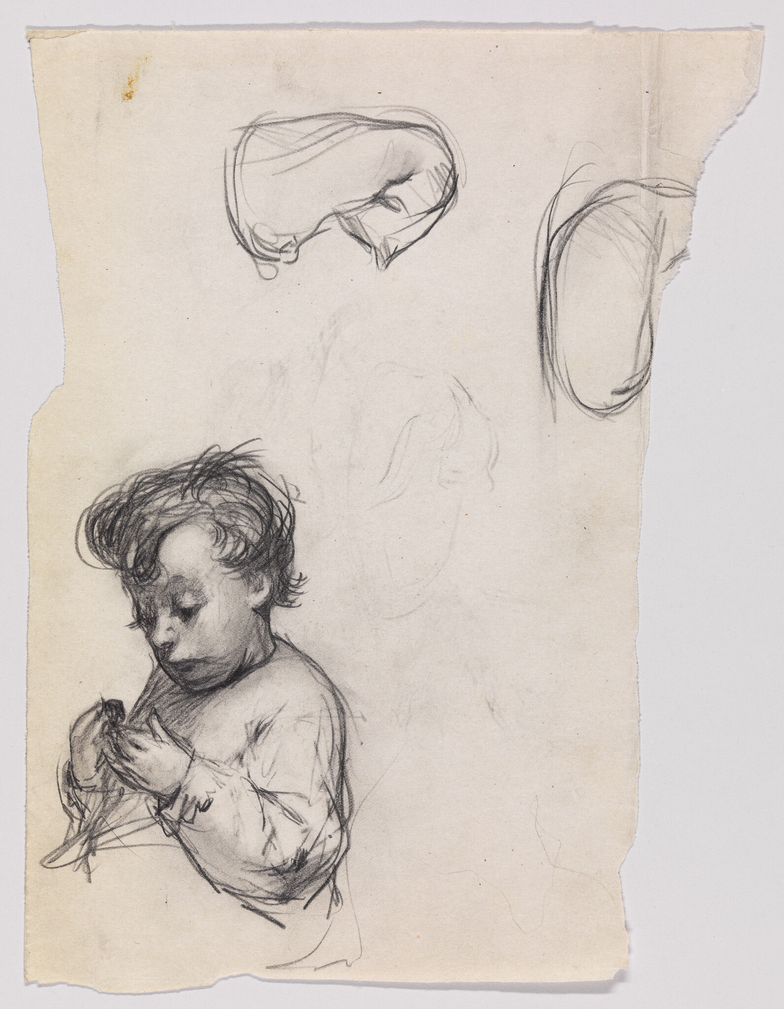 A charcoal sketch of a young child intently holding and examining a small object.