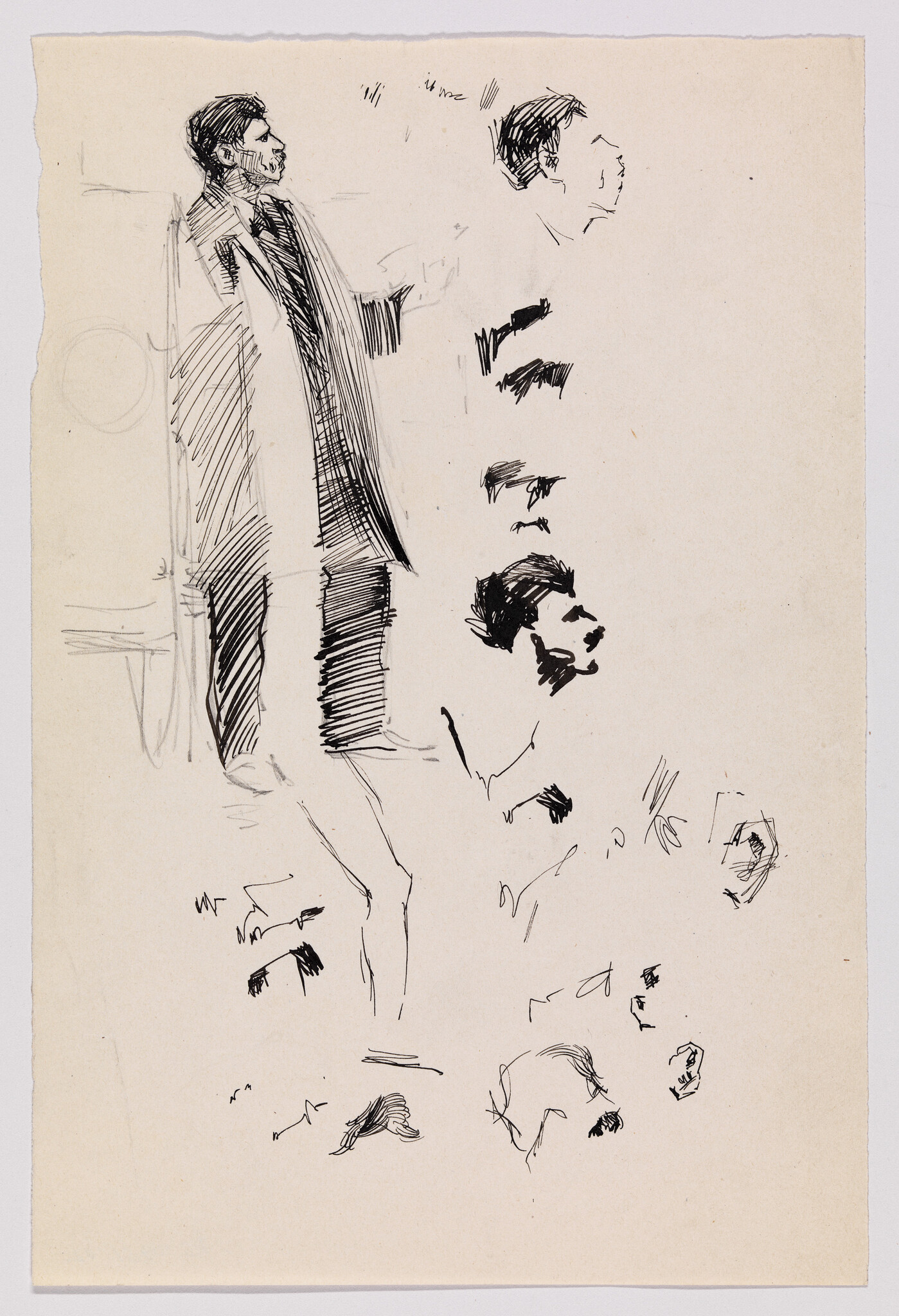 Man in long coat standing and gesturing, surrounded by quick ink studies of heads and features.