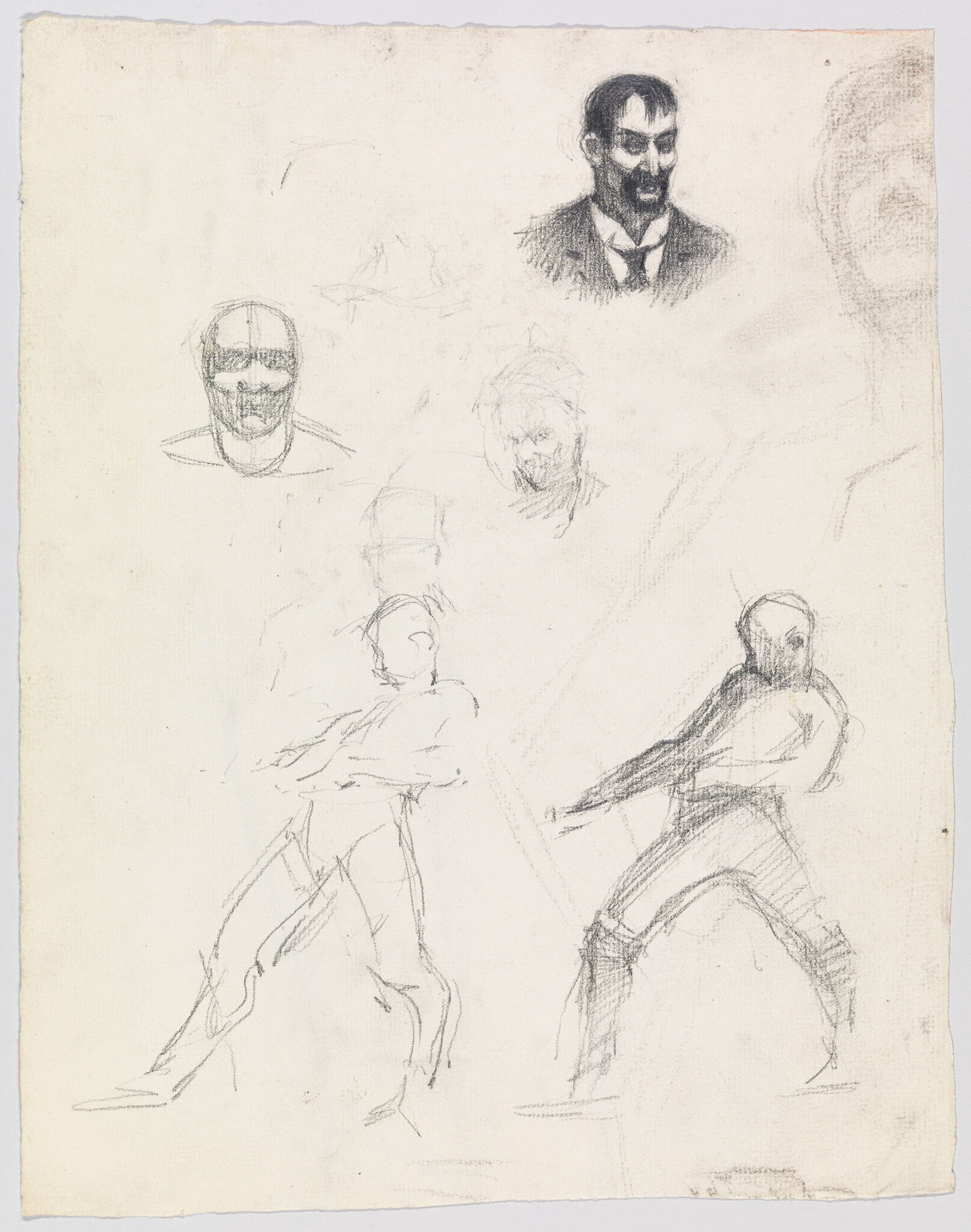 Multiple quick pencil sketches showing male heads and two dynamic standing figure poses on paper.