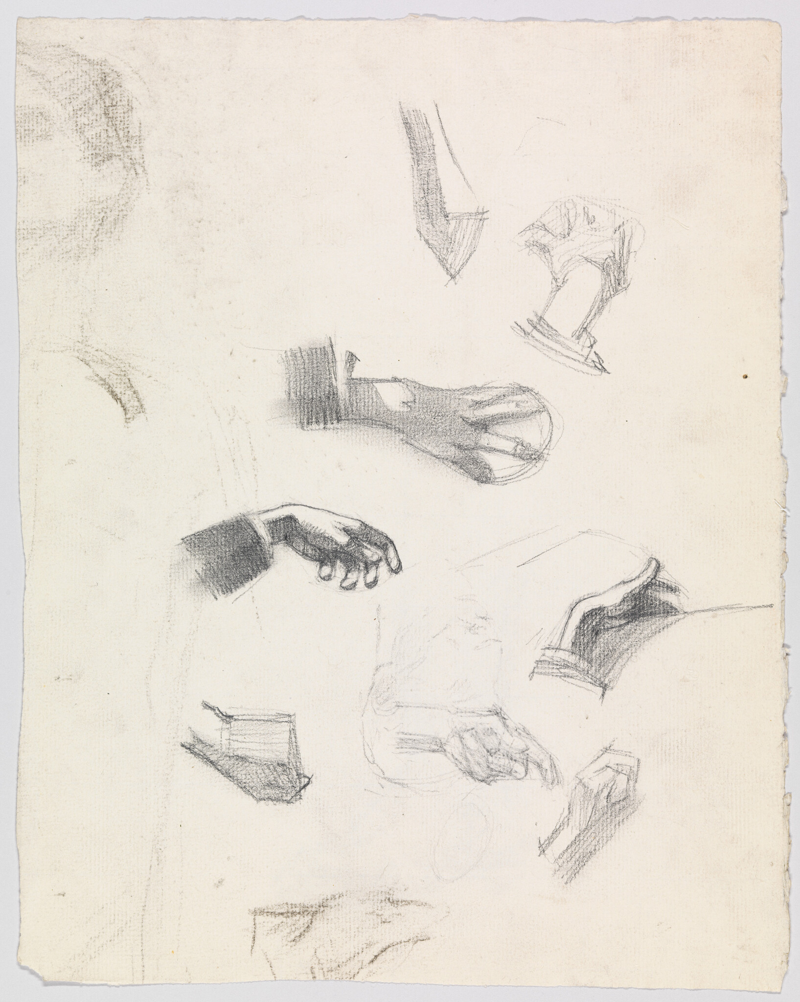 Several pencil sketches of hands in different poses on a sheet of paper.