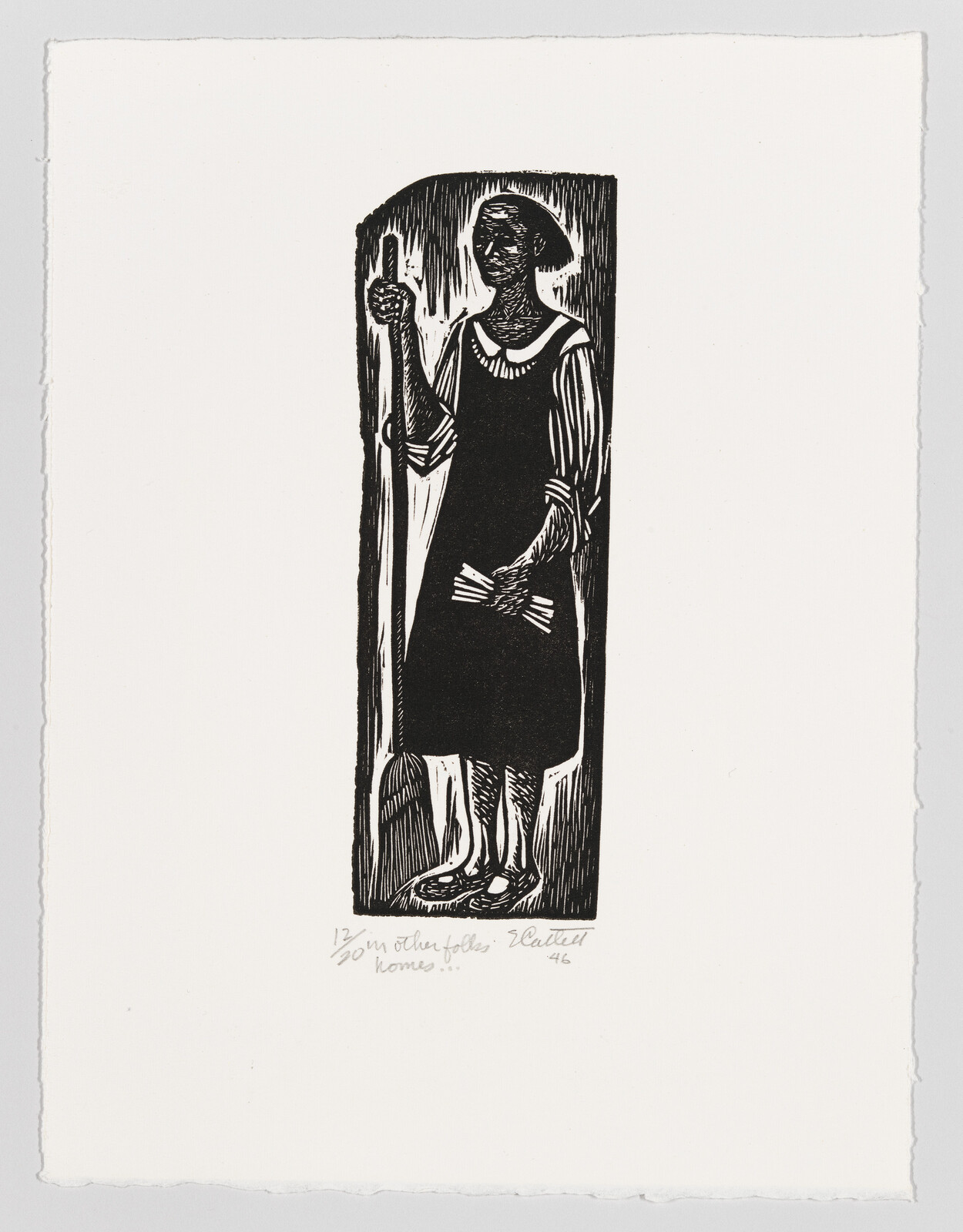 A person in a dress holds a broom, standing with a serious expression.