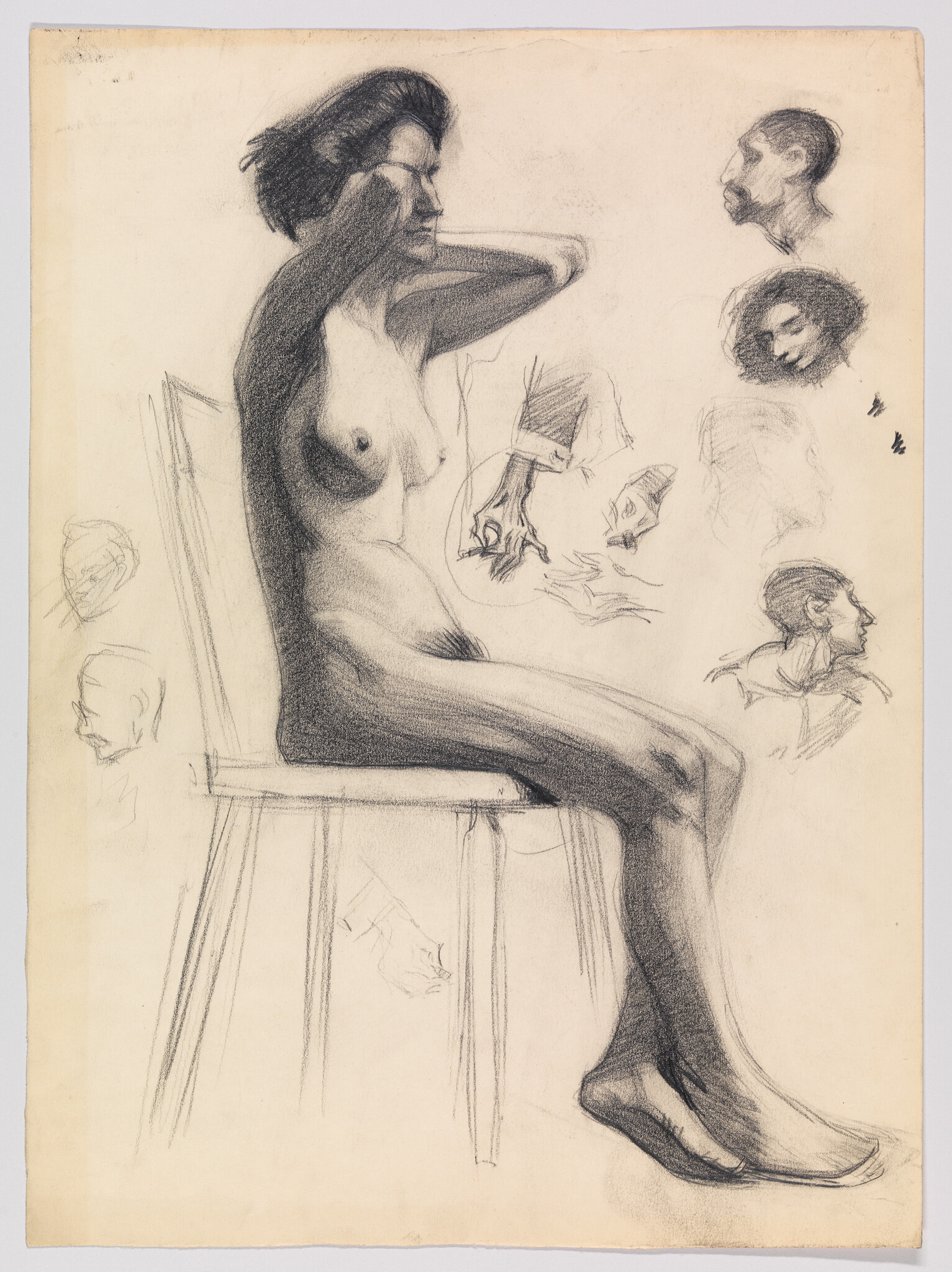 A seated nude woman on a chair adjusts her hair while various head and hand studies surround her.