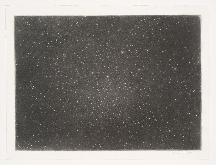 A dense field of stars scattered across a dark night sky with varying brightness.