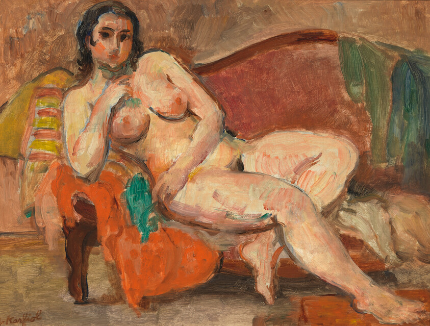 A nude woman reclines on a couch, resting her head on one hand and draped with colorful cloth.