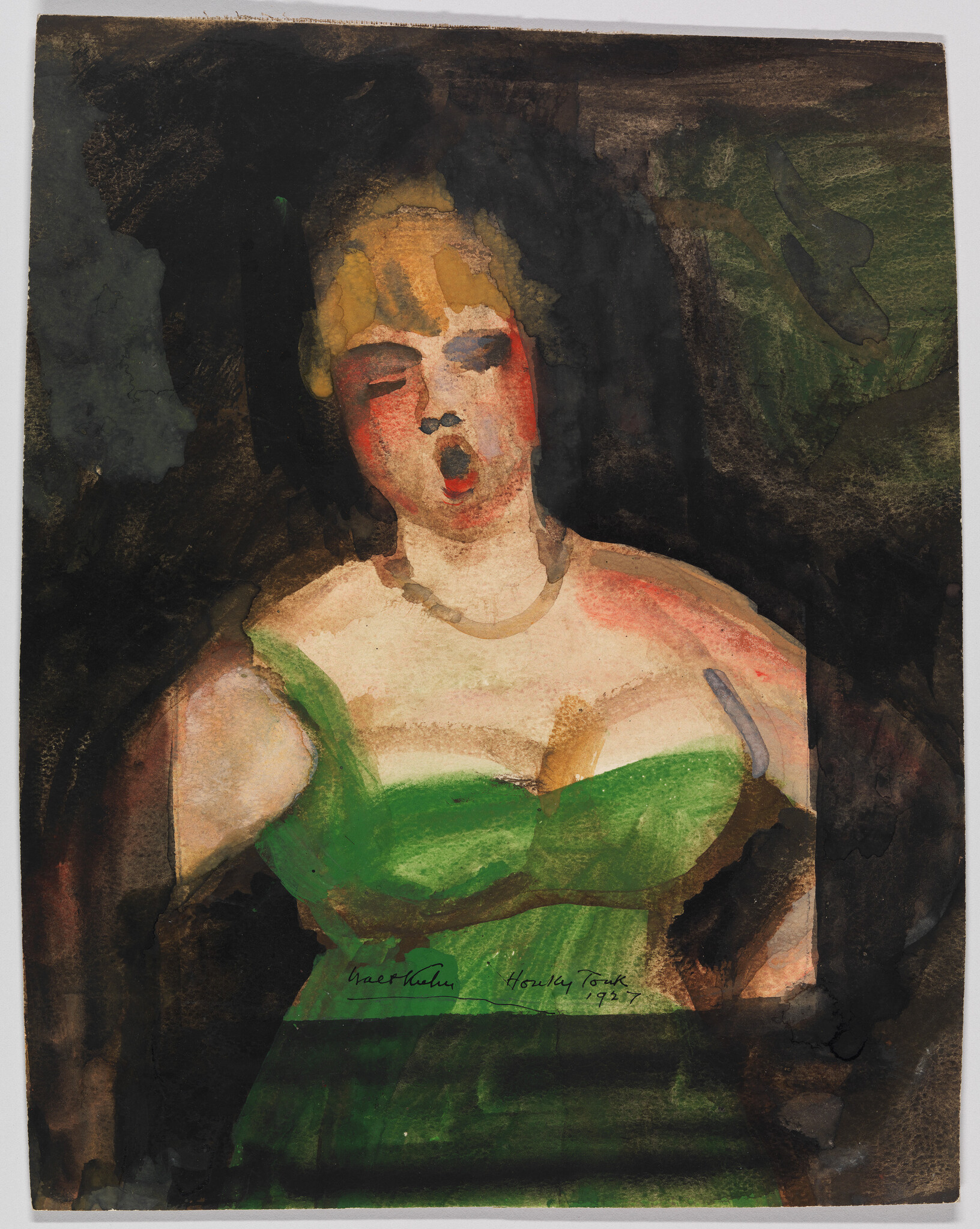 A woman in a green dress sings with her mouth open against a dark background.