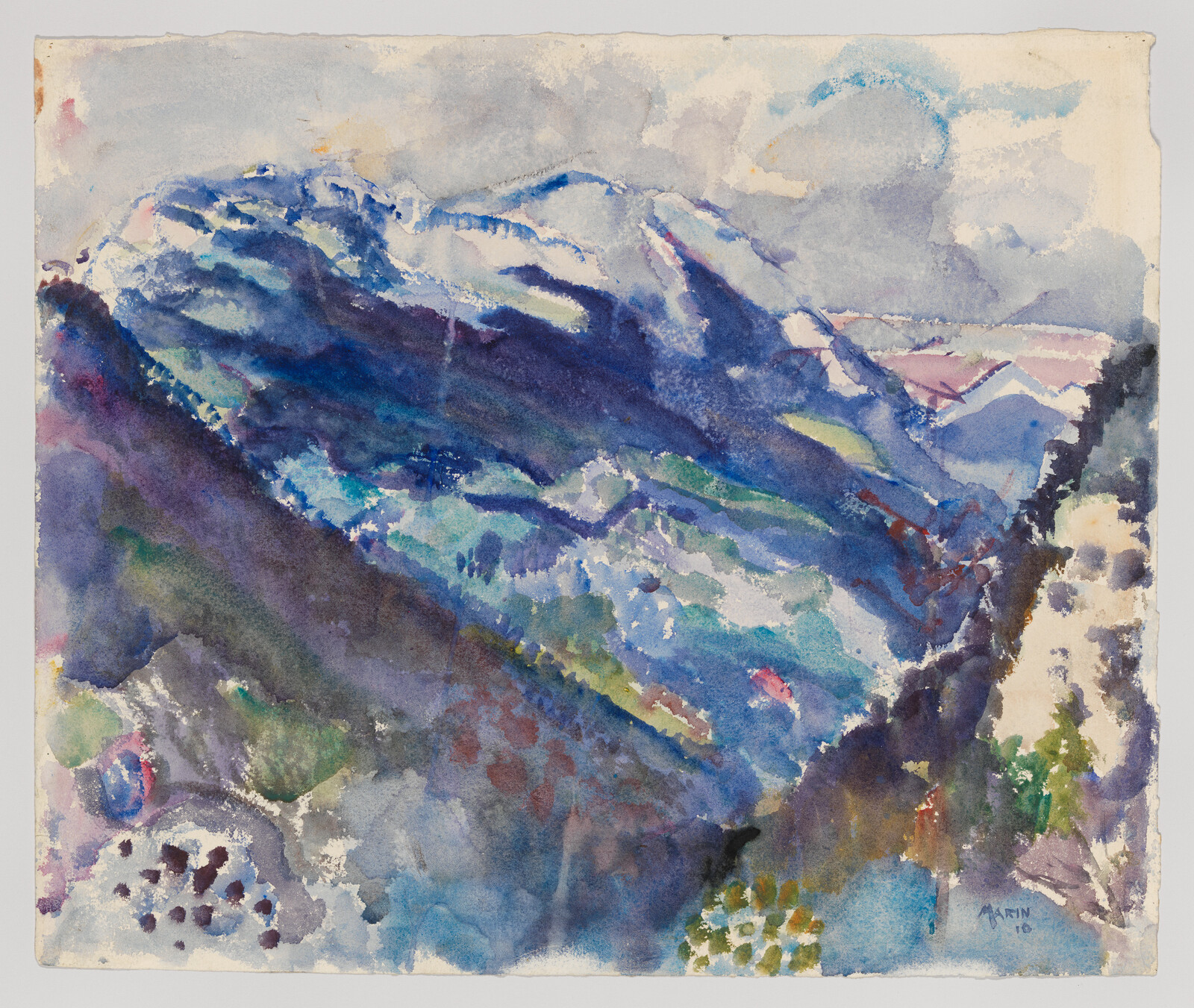 Blue and purple watercolor mountains rise over a misty valley under a cloudy sky.