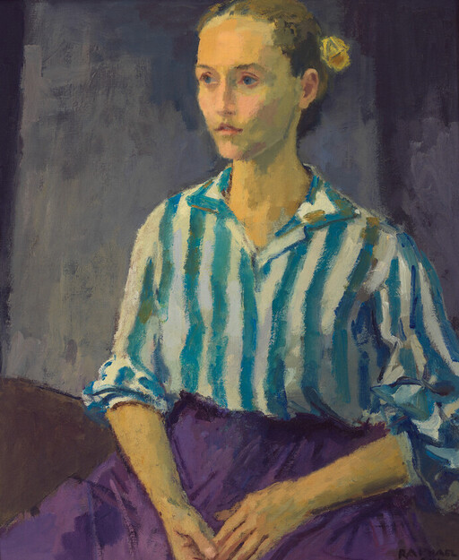 Young woman sits with folded hands, wearing a blue-striped shirt and purple skirt.