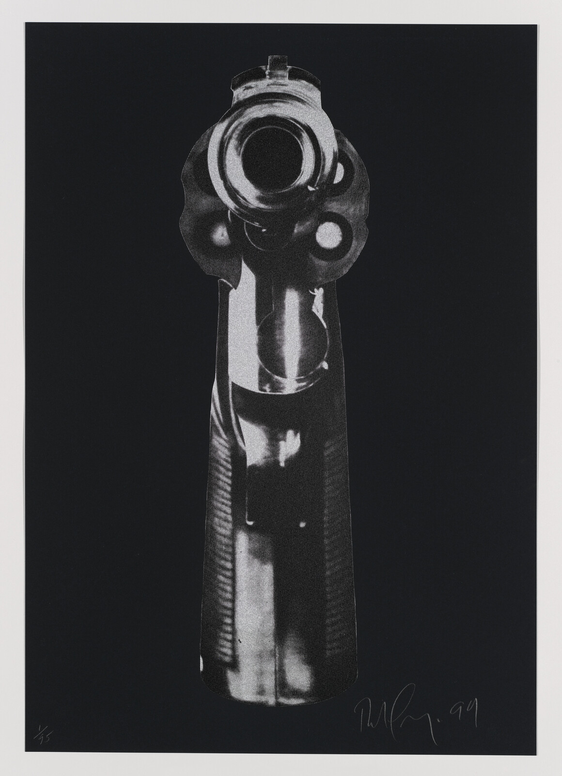 A black and white image showing the barrel of a revolver pointed directly toward the viewer.