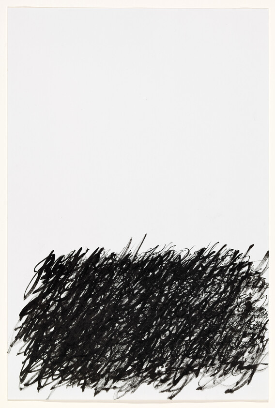 Dense black scribble fills the lower third of a mostly blank white page.