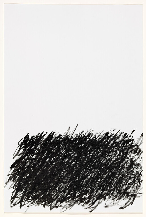 Dense black scribble fills the lower third of a mostly blank white page.