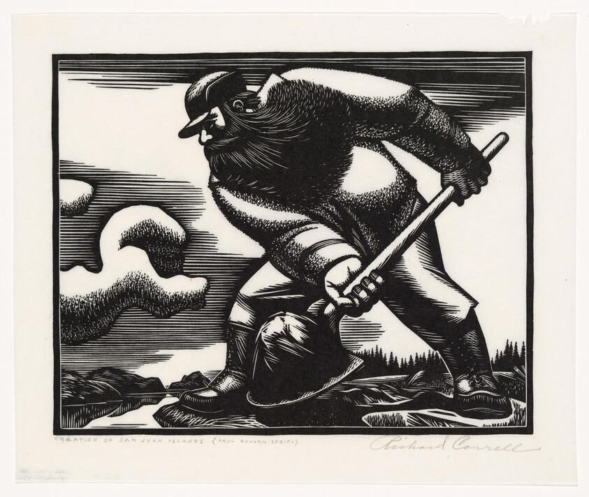 A large bearded man using a long pry bar to dig on a rocky shoreline.