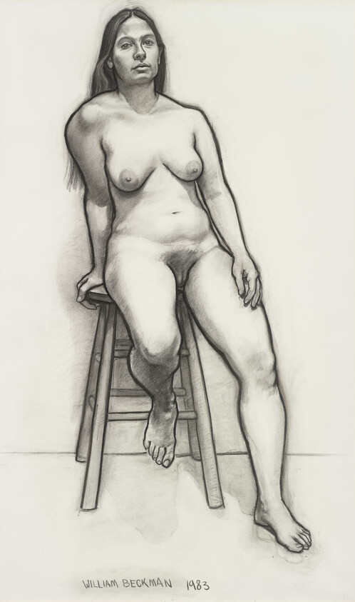 A nude woman sits on a wooden stool, one foot on a rung and one on the floor.