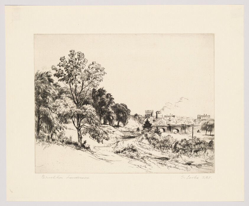 A dirt path winds through trees toward a bridge and a distant town.