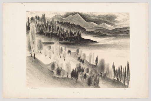 Hills and trees sloping down to a calm lake with mountains in the background.