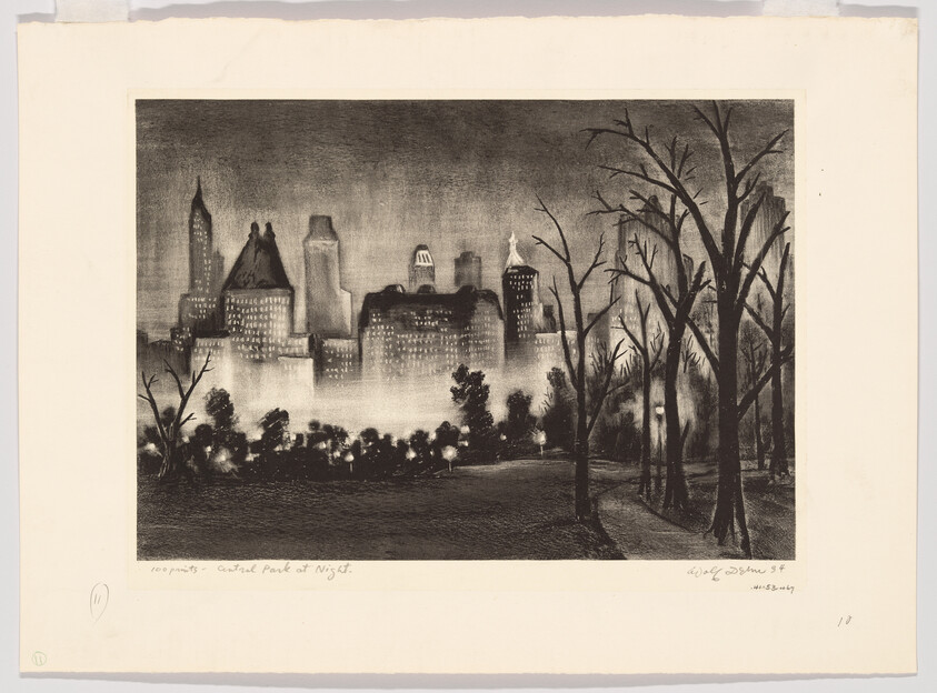 A foggy city skyline glows behind bare trees and lamplights in a dark park at night.