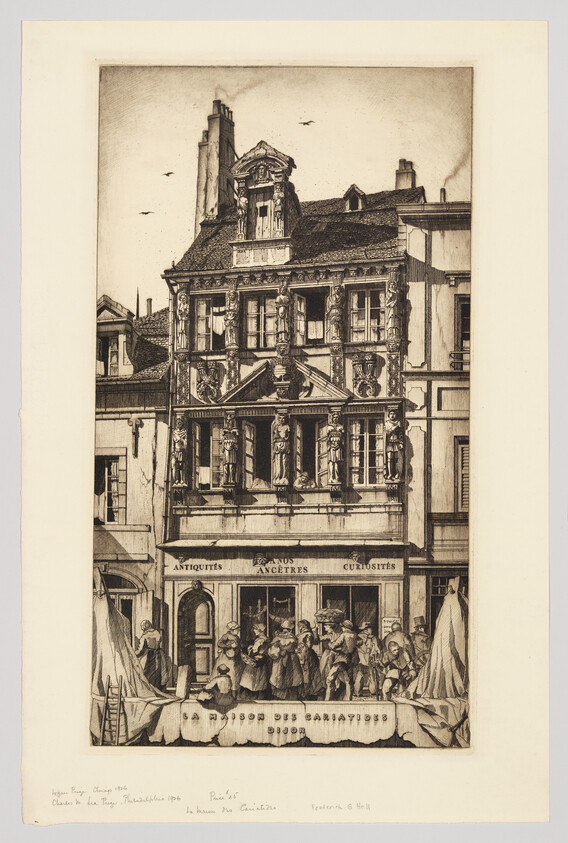 Ornate three-story building with sculpted caryatid figures and a crowd gathered at the street-level shop.