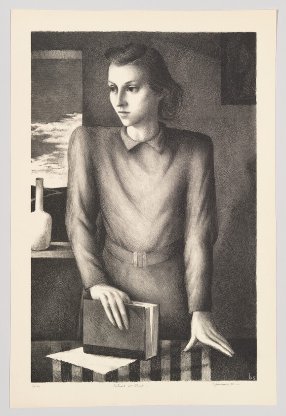 A woman stands at a table, one hand resting on a closed book while she gazes out.