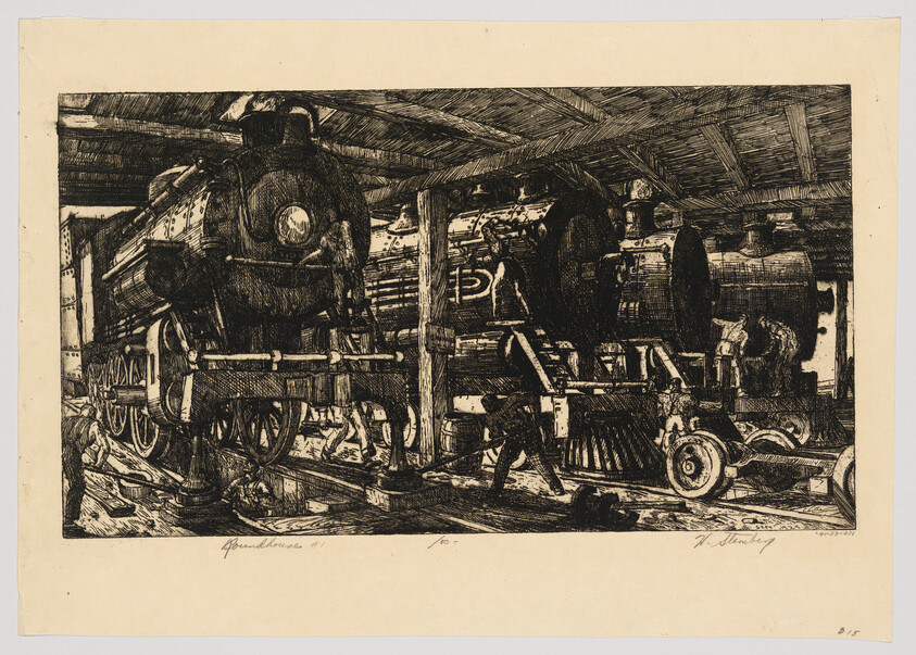 Three steam locomotives sit under a wooden shed while workers perform maintenance.