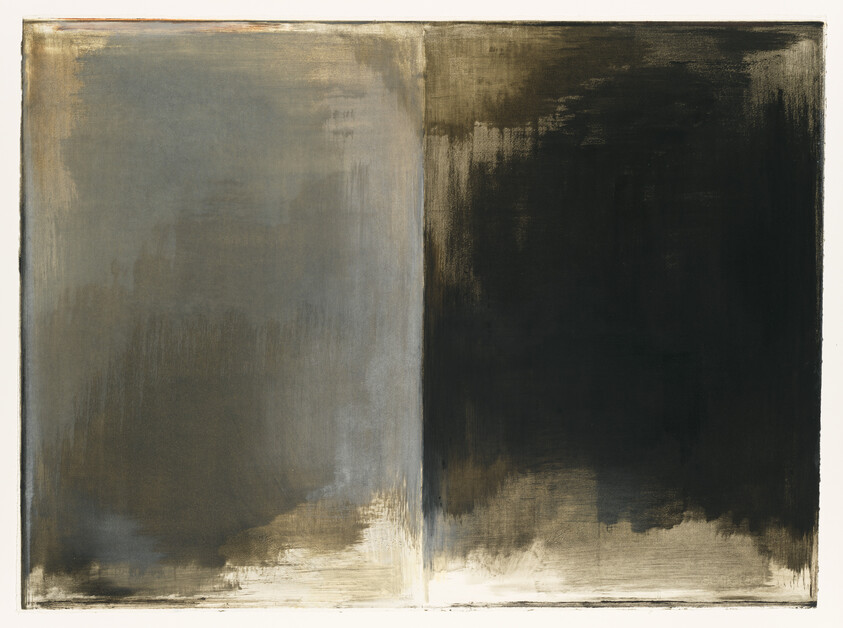 Two large vertical panels painted with soft gray on the left and deep black on the right.