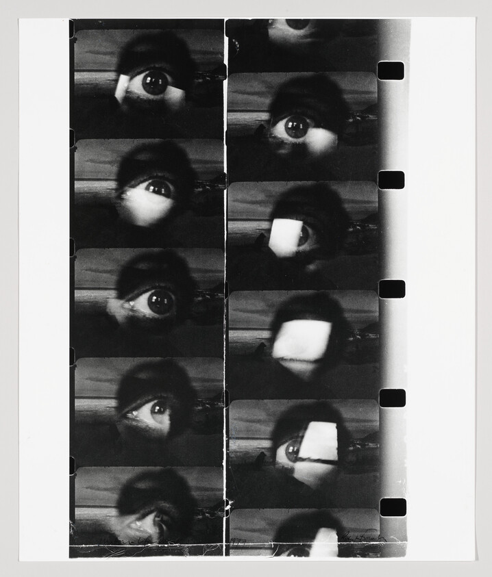 Repeated film-strip frames showing a close-up eye, with some frames partly obscured by a white square.