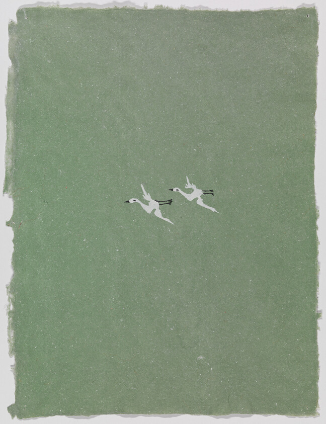 Two white birds fly together across a plain green textured background.