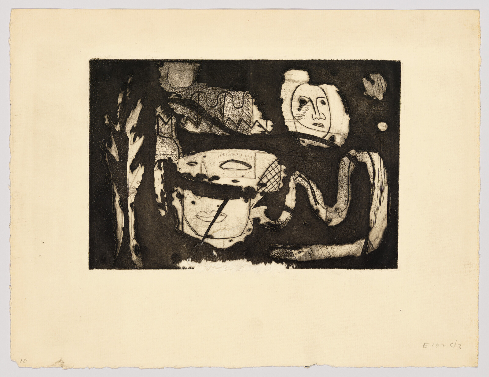 An etching with abstract and figurative elements on a cream-colored paper. The composition includes a central circular form resembling a face surrounded by various patterns and shapes, with a dark background providing contrast. The artwork has a rough, textured appearance and is signed and dated in the lower right corner.