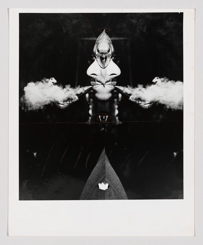 A mirrored surreal portrait of a man smoking two pipes that blow clouds of smoke.