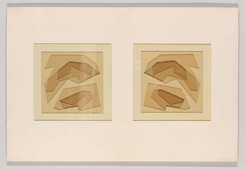 Two framed abstract geometric constructions with layered brown shapes mounted on a large cream mat.