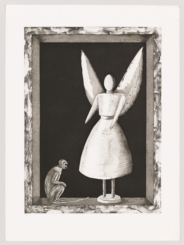 A wooden angel mannequin with large wings stands inside a shadowed frame while a small monkey crouches beside it.
