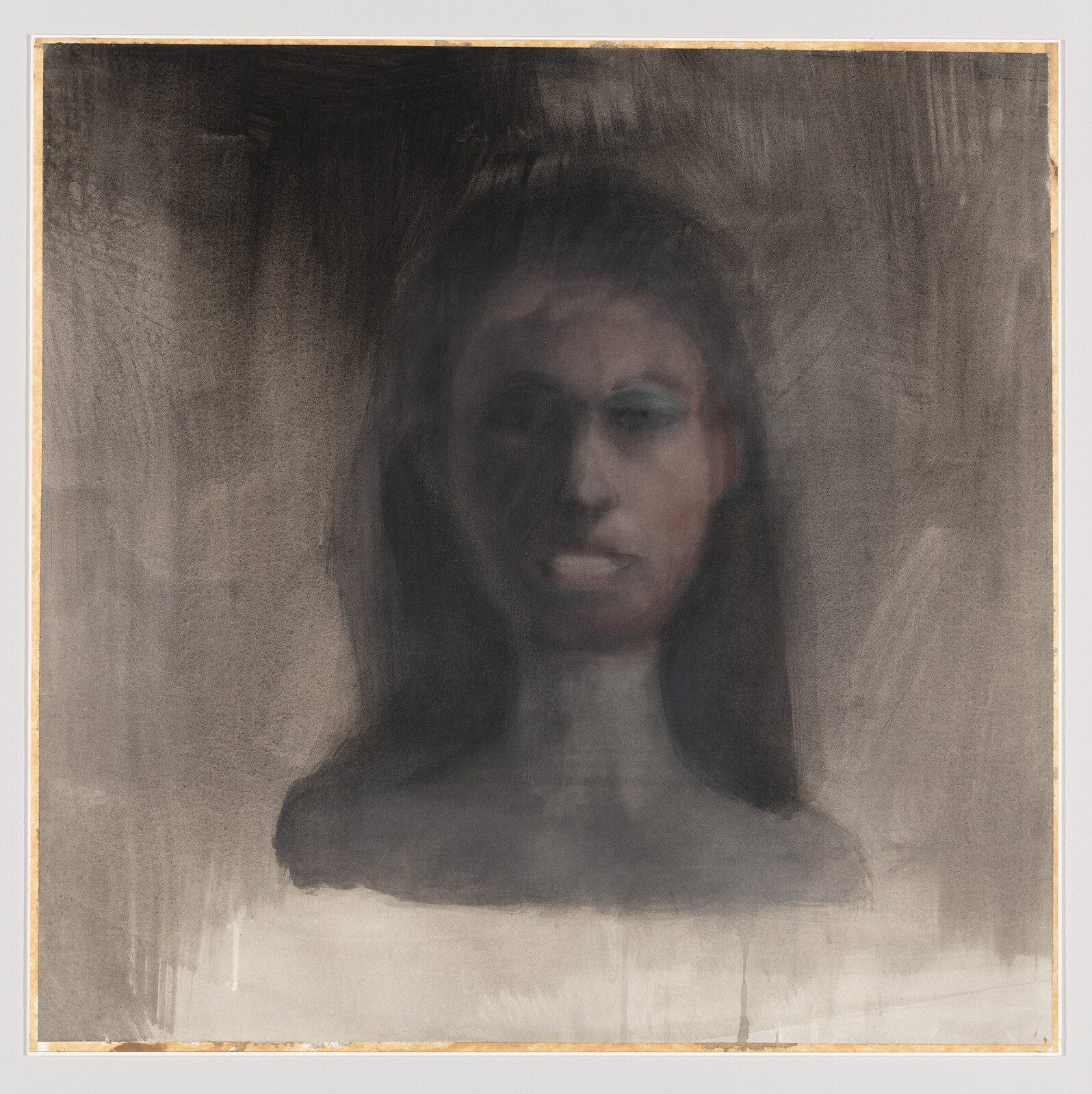 A hazy, dark portrait of a woman's head and shoulders with indistinct facial features.