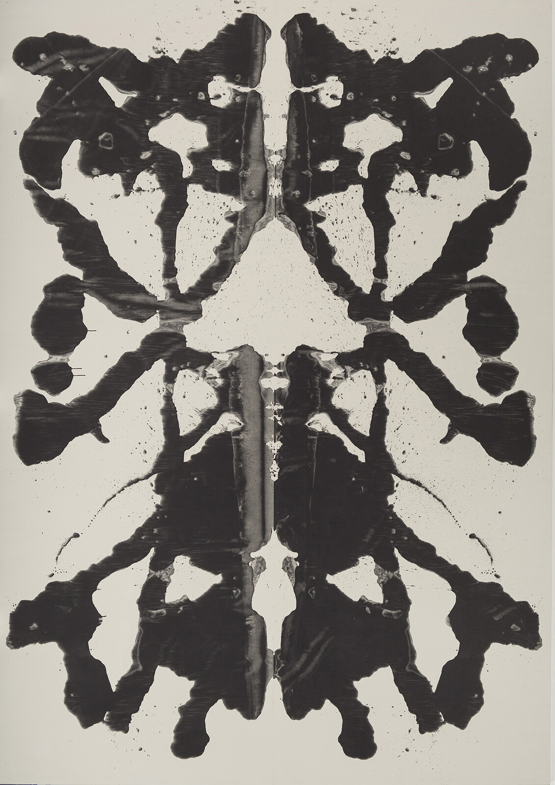 A black and white Rorschach inkblot symmetrical image with abstract patterns that could be interpreted in various ways, displayed on a vertical canvas.