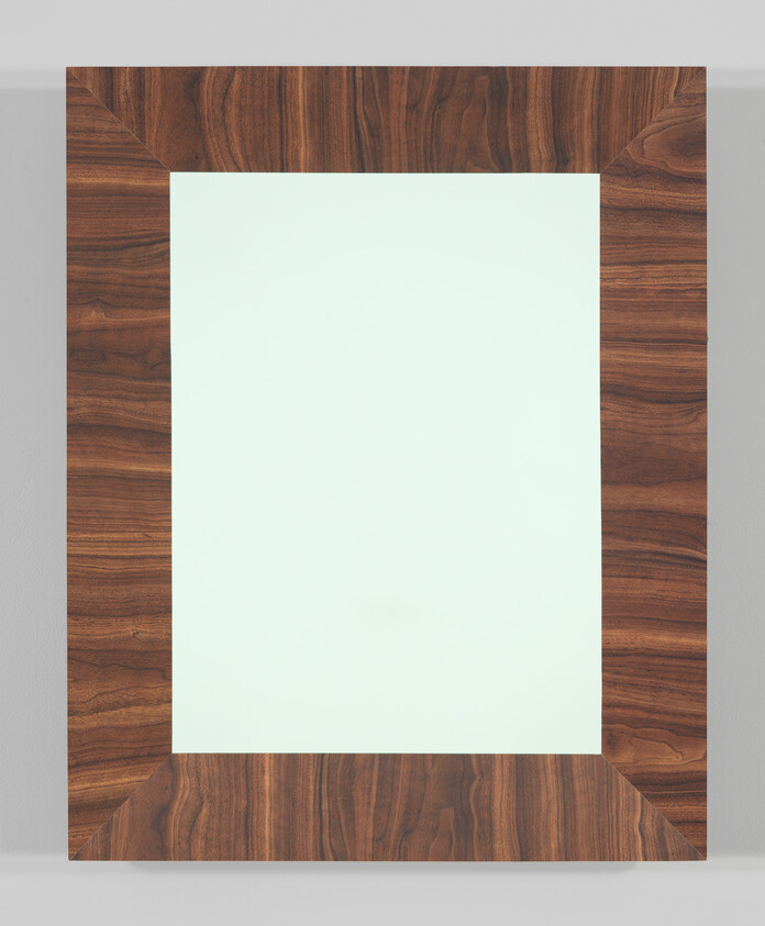 A square-shaped wooden frame with a rich, dark brown grain pattern surrounding a blank white center.