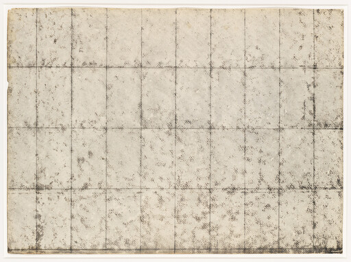 A worn, beige paper sheet marked by a faded grid of fold lines and dark stains.