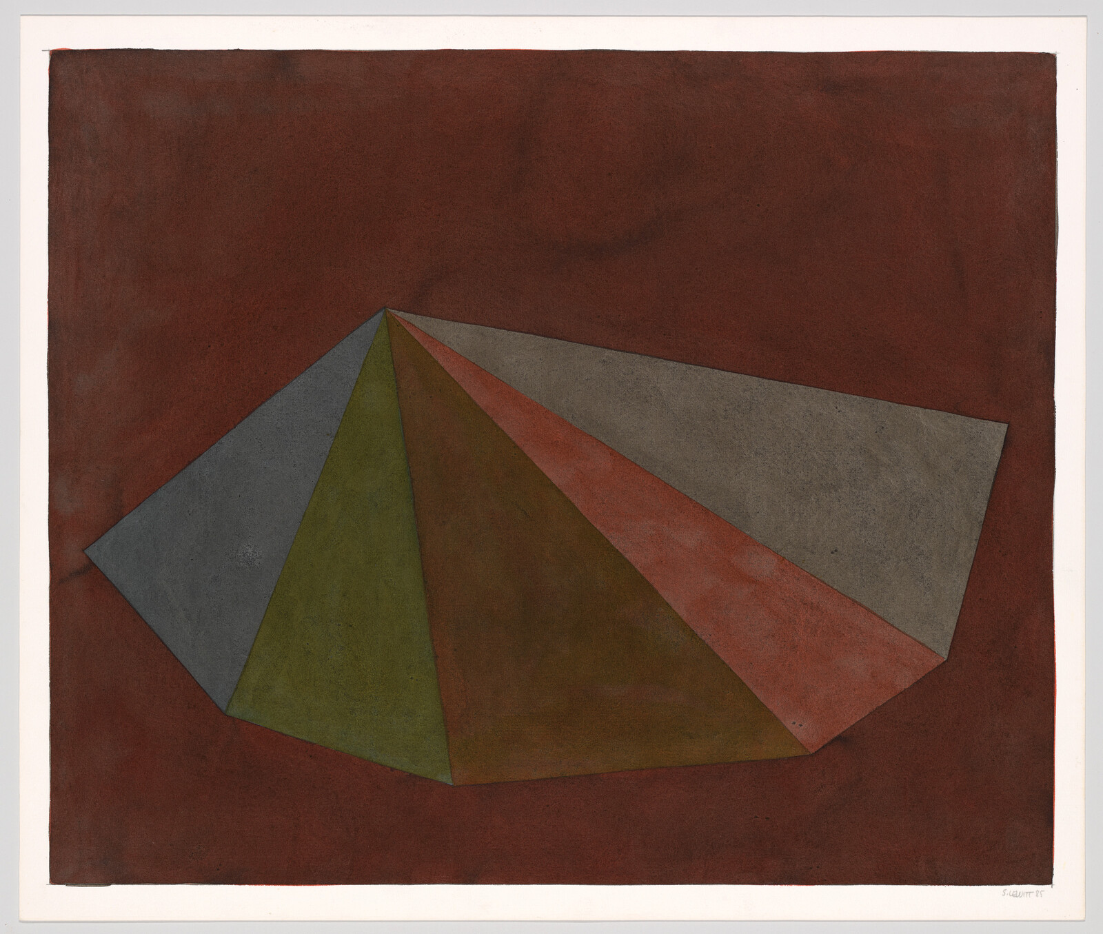 A low polygonal fan of muted gray, green, brown, and red shapes rests on a dark background.