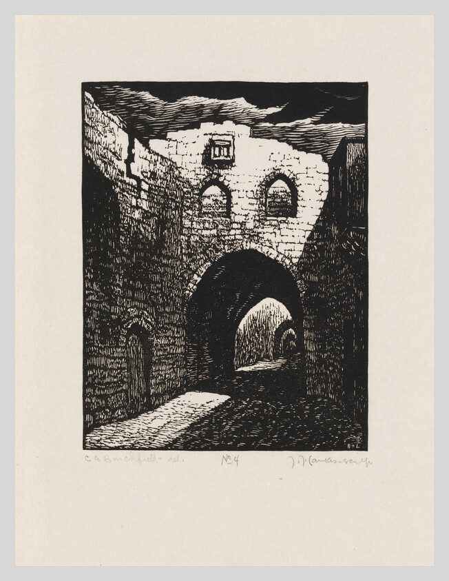 Ruined stone archway leading into a dark passage with light visible at the far end.