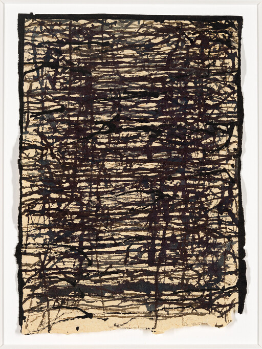 Abstract sheet of aged paper covered with dense black ink lines forming chaotic horizontal and vertical patterns.