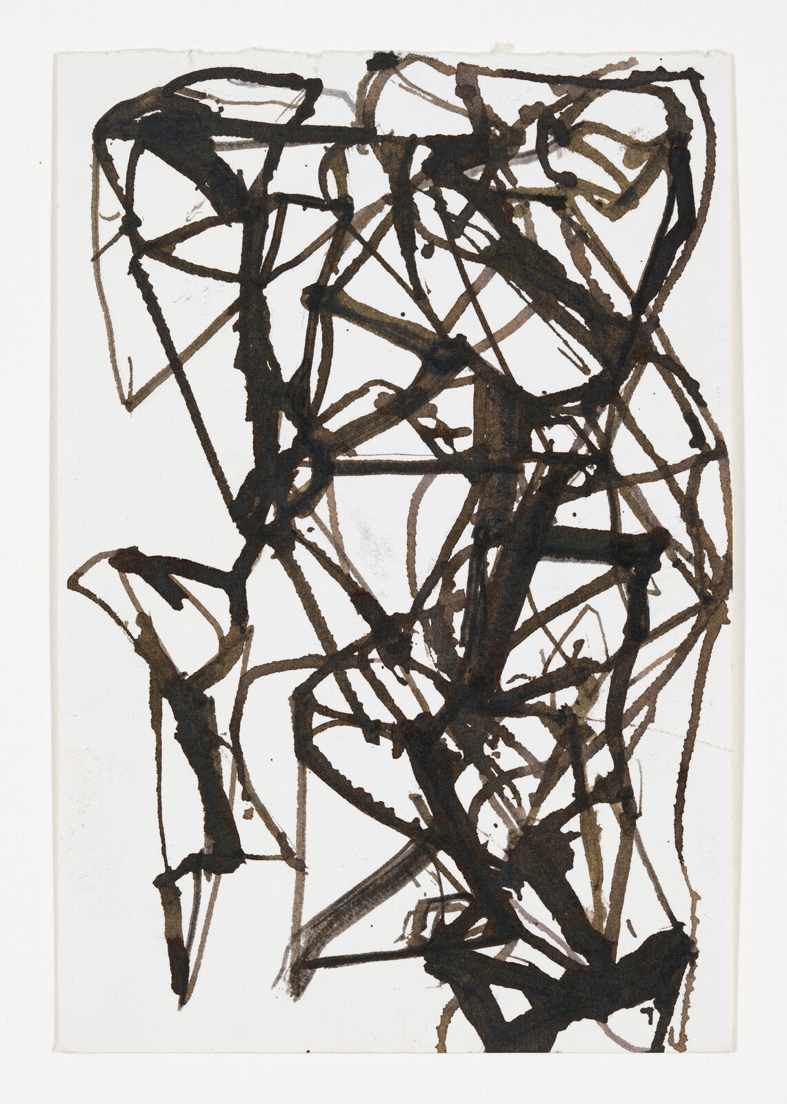 Dense black ink scribbles crisscross a white sheet creating an abstract tangled pattern.