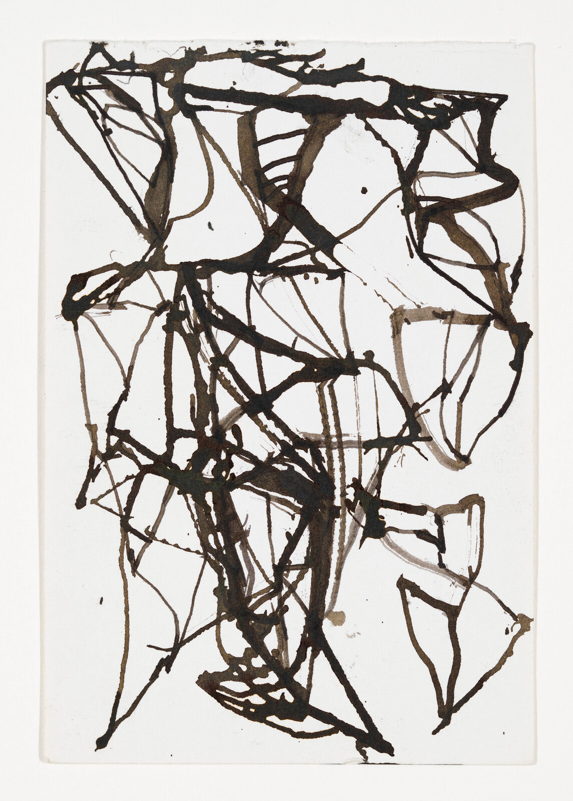 Black ink forms tangled, overlapping lines and shapes across a white sheet, creating an abstract network.