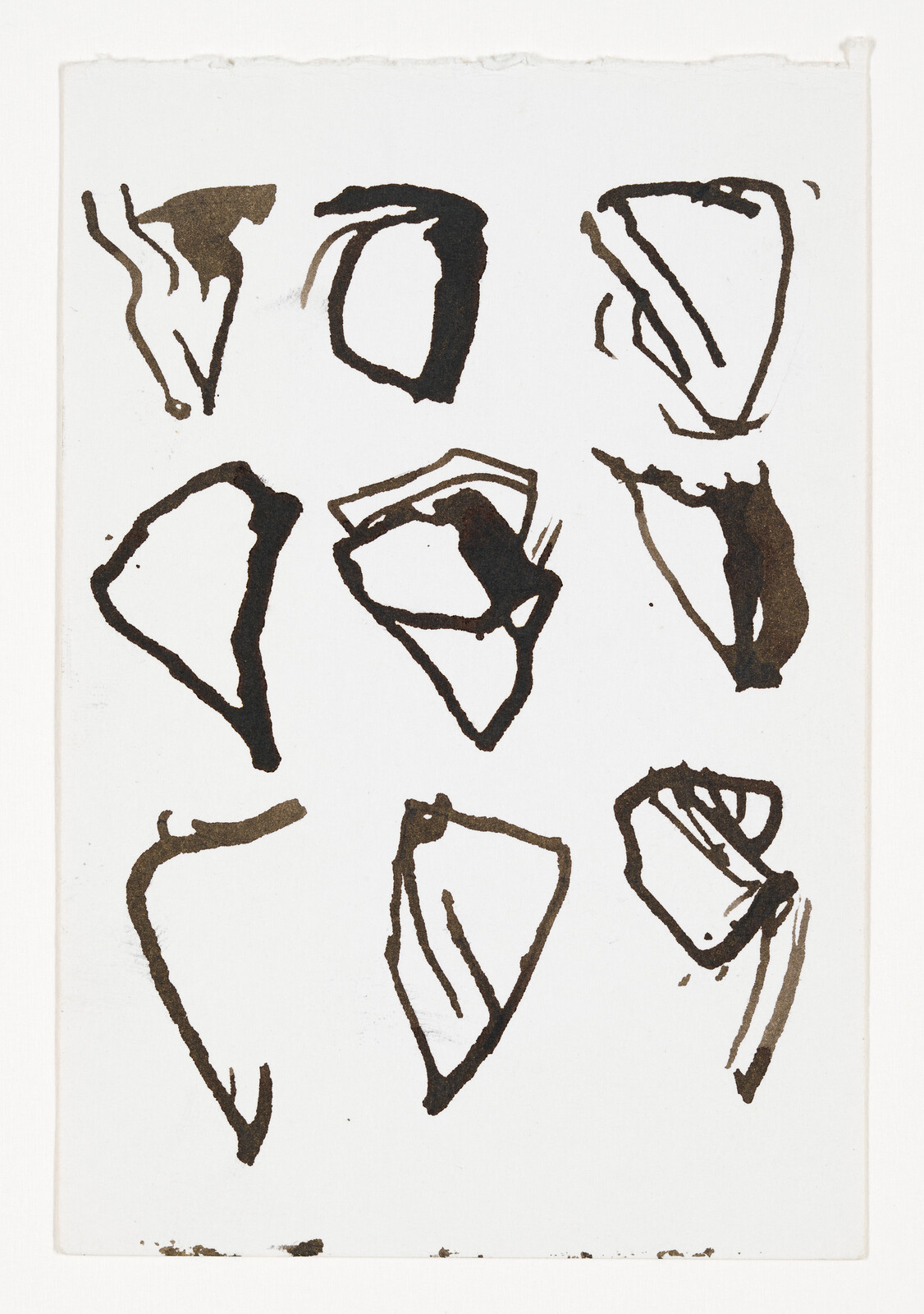 Nine loose black ink sketches of irregular triangular shapes arranged on a white sheet.