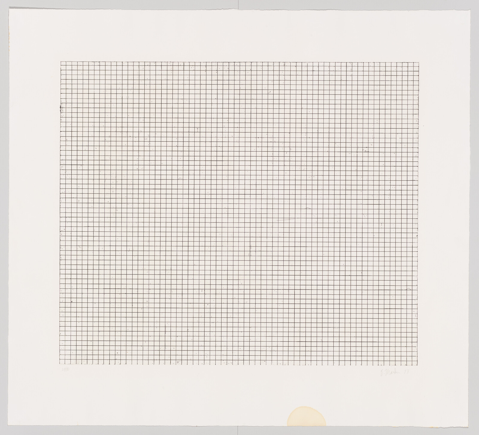 Large square grid of fine black lines printed on white paper with a small brown stain.
