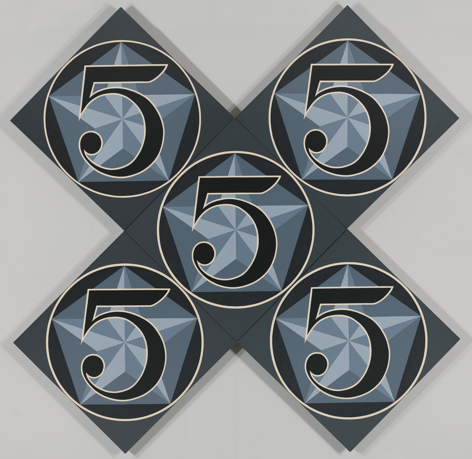 Five dark blue tiles each showing a large decorative number 5 arranged in an X pattern.