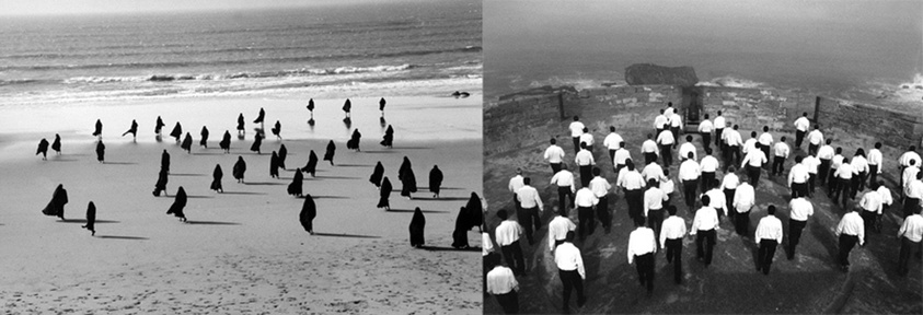 Two synchorized black and white films, with the left side showing veiled women on a desert and the right side showing men in Western style suits roaming a human made fortress