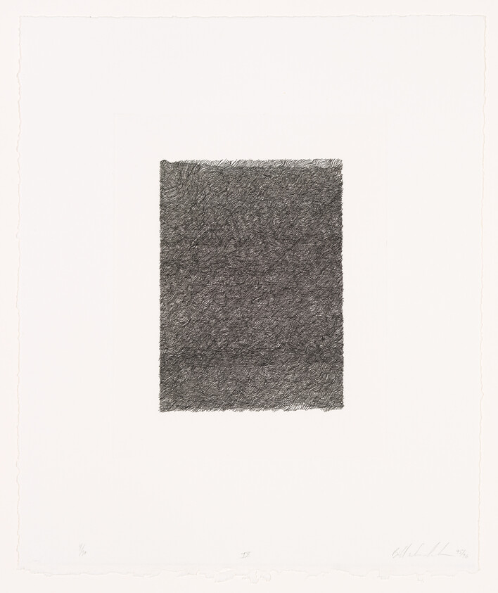 Dense black rectangular scribble centered on a white sheet of paper.