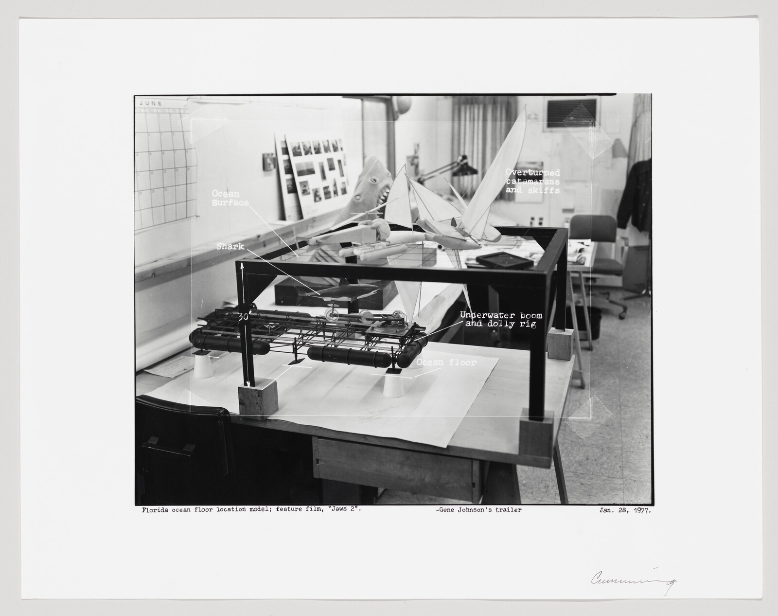 Scale model of an ocean floor with a shark and overturned boats for the film Jaws 2.