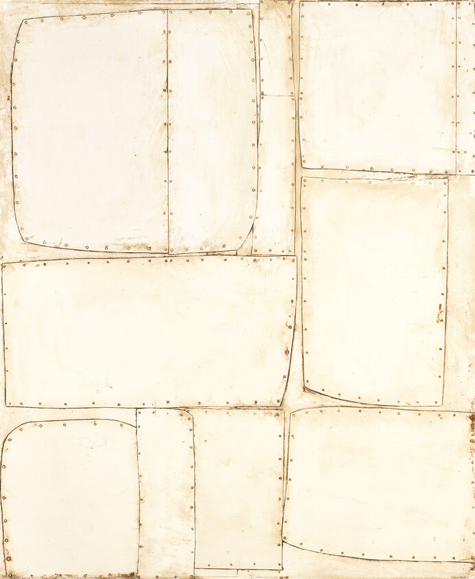 Worn cream-colored metal plates arranged in a stitched patchwork with visible rivets and seam lines.