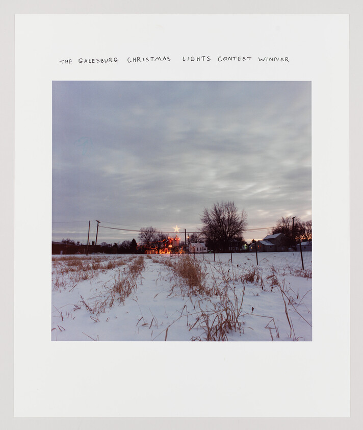 Snowy field with distant festive lights at dusk, titled "The Galesburg Christmas Lights Contest Winner."