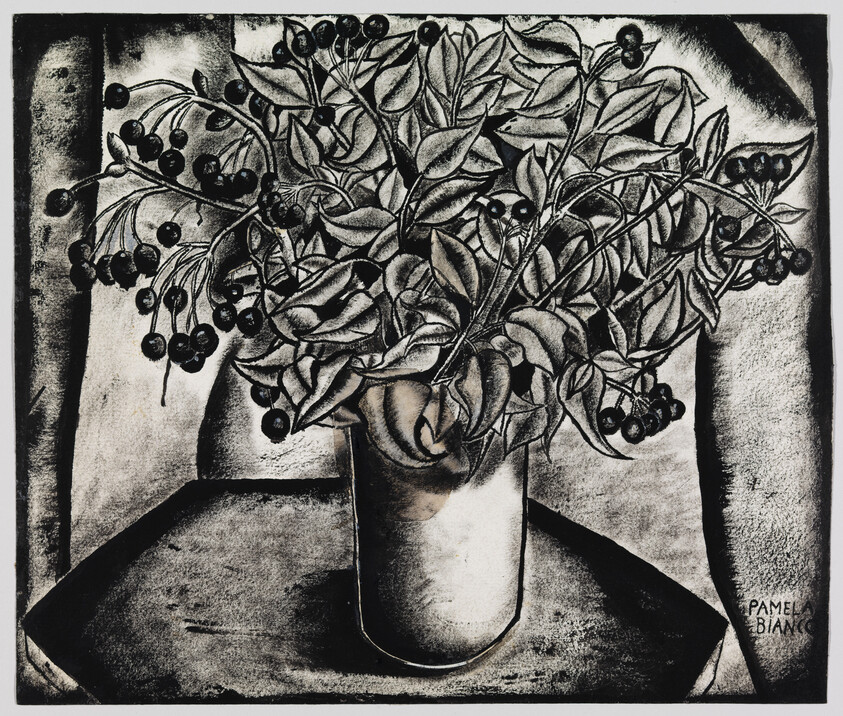 A vase holding dense leafy branches with clusters of round berries on a table.