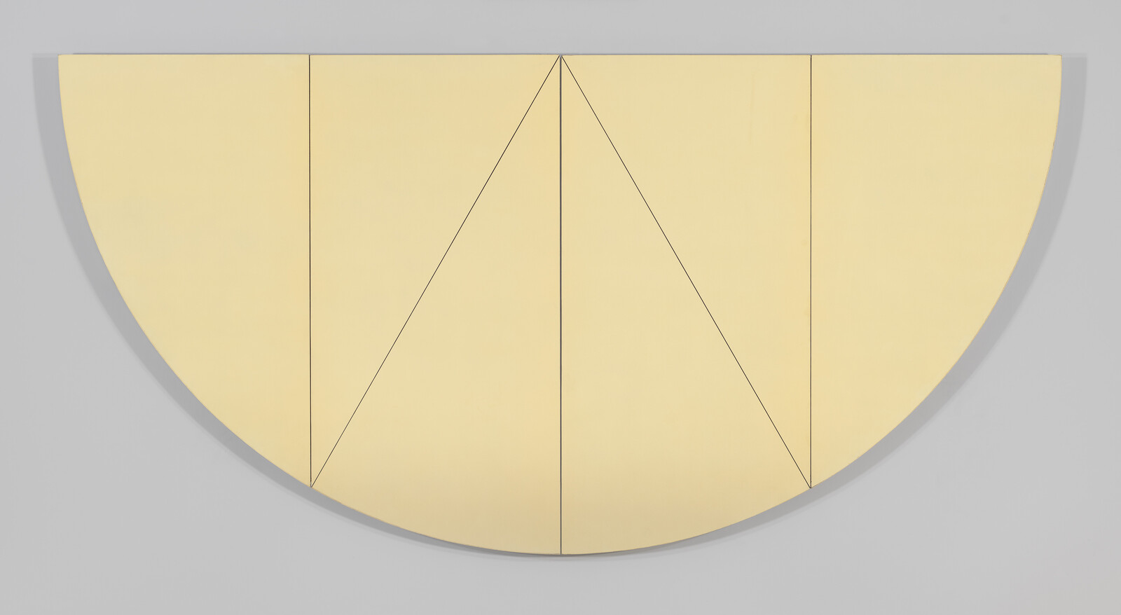 A semi-circular, pale yellow artwork divided into geometric sections by black lines, displayed against a light grey background.