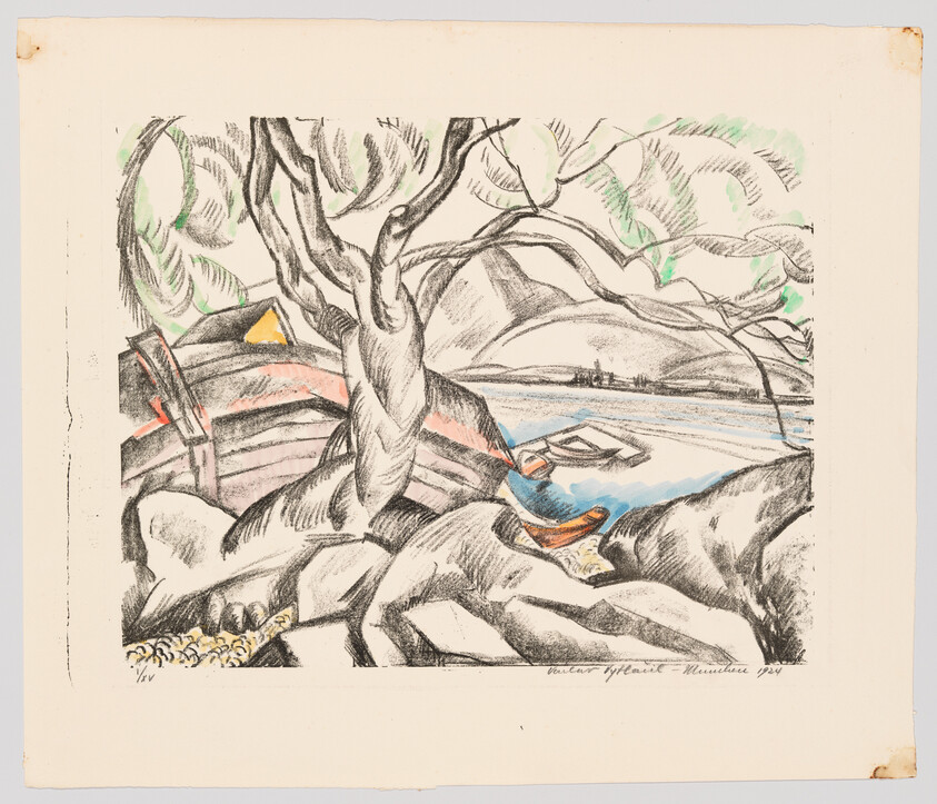 Large twisted tree beside a rocky shore with overturned boats and mountains across the lake.